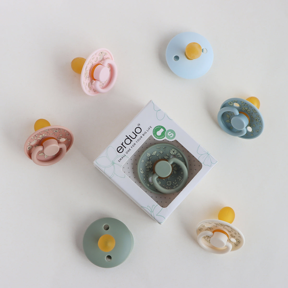 מוצץ סיליקון לתינוק בצבעי מקרון